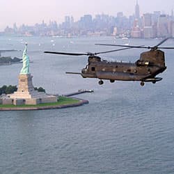 A 160th Special Operations Aviation Regiment MH-47 <i>Chinook</i> conducts a training flight over New York Harbor in September 2003.