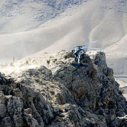 Special Forces soldiers are extracted from a mountain pinnacle in Zabul Province, Afghanistan, by a UH-60 <i>Black Hawk</i> helicopter in 2010.