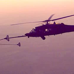 An MH-60 <i>Black Hawk</i> from the 160th Special Operations Aviation Regiment conducts aerial refueling, 2013. 