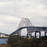 The Bridge of the Americas spans the Panama Canal on the Pacific side, near Panama City. During JUST CAUSE, it provided a ground link between Howard Air Force Base on the canal’s west side, and the constellation of U.S. bases to the east, including Albrook Air Station. 112th Signal Battalion soldiers deployed to Panama for JUST CAUSE arrived at Howard, then reported to SOCSOUTH HQ at Albrook.