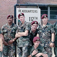 112th Signal Battalion soldiers pose outside their temporary battalion headquarters near Gruber Road on Fort Bragg, NC, circa fall 1986. The battalion relocated across post early the following year. (Photo Courtesy of William D. Childs)