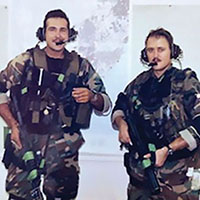 SSG Earl G. Meyer, left, and SSG Deams B. Smith, right, of ODA 793, Company C, 3-7th SFG, prior to departure for the Radio Nacional mission. Meyer’s primary weapon is the Colt Commando CAR-15 assault rifle while Smith has an MP5 submachine gun with suppressor. On the wall is a map of Panama used in mission planning.
