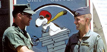 Captain (Capt.) Charles P. ‘Toby’ Rushforth, III (right), the second COVEY (252) over Lang Vei on 7 February 1968, directed U.S. Navy A-1J Skyraiders  (‘Super Spads’), VA-25, against NVA forces occupying the SF camp.