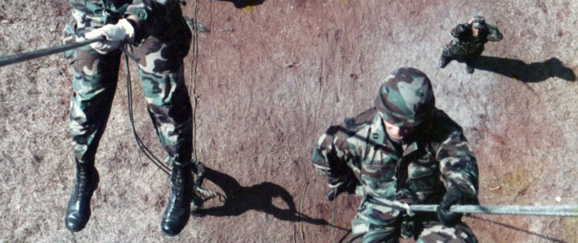 CPT Steve Kestner and another unidentified Company A, 112th Signal Battalion soldier conduct rappel training at Fort Bragg, NC (circa 1989-90).