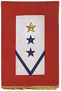 This banner with the Gold Star above the other two Blue Stars reflects the loss of a serving family member during WWI.