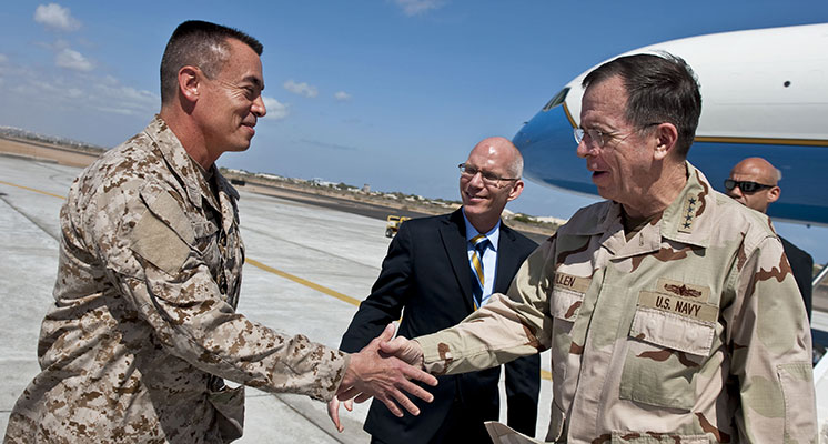 RADM Brian L. Losey, Commander, Combined-Joint Task Force - Horn of Africa, greets Admiral Mike Mullen, Chairman, Joint Chiefs of Staff, in Djibouti, on 24 February 2011, shortly before assuming command of SOCAFRICA.