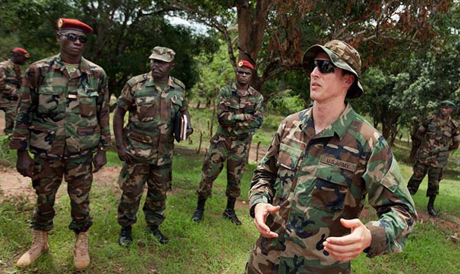 A U.S. Army SF soldier instructs Ugandan and Central African Republic soldiers assigned to the AU-RTF in 2012.