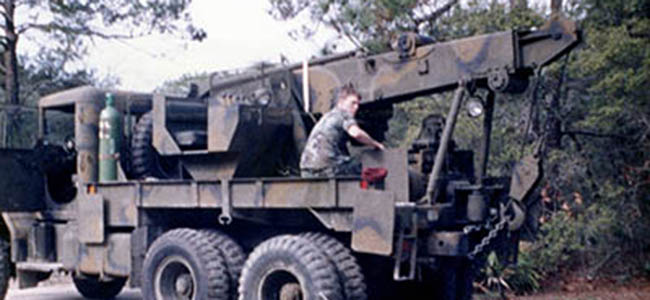 An unidentified Maintenance Detachment soldier works on a hand-me-down M816 wrecker. CW3 James M. ‘Jim’ Zeitler used the second-hand wrecker as a training tool for his young mechanics. 