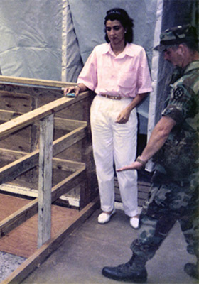 MAJ Cheek discusses the sanitation facilities with Señora Calderón. She told him that the facilities, while basic to him, were nicer than what the DCs had prior to the war.
