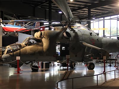 The Mi-24 on display at the Southern Museum of Flight in Birmingham, Alabama. Most visitors probably do not realize the tremendous effort required to bring the Soviet helicopter to the United States or for what purpose.