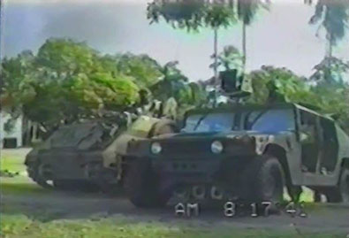 A 450-watt AN/UIH-6A loudspeaker mounted on a High Mobility Multipurpose Wheeled Vehicle (HMMWV), as used outside of the Papal Nunciature.