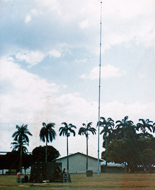 Located at Corozal and run by 90th SDC soldiers, the TAMT-10 was an S280 shelter mounted on a commercial flatbed trailer. The shelter contained a 10,000-watt tunable medium-wave AM transmitter, a 1,000-watt shortwave transmitter, and basic audio production equipment to produce programming. A trailer carried the 125’ quick-erect antenna and ancillary gear.