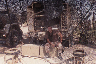 SGT Stephen R. Anderson is pictured here at the ROWPU site, was the Headquarters Company Supply Sergeant. Early in DESERT SHIELD, he was tabbed to be the NCOIC for the water purification mission.