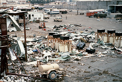 Clean-up proceeds at the site where an Iraqi Scud missile struck a warehouse occupied by the 475th Quartermaster Group (Provisional) on 25 February 1991.