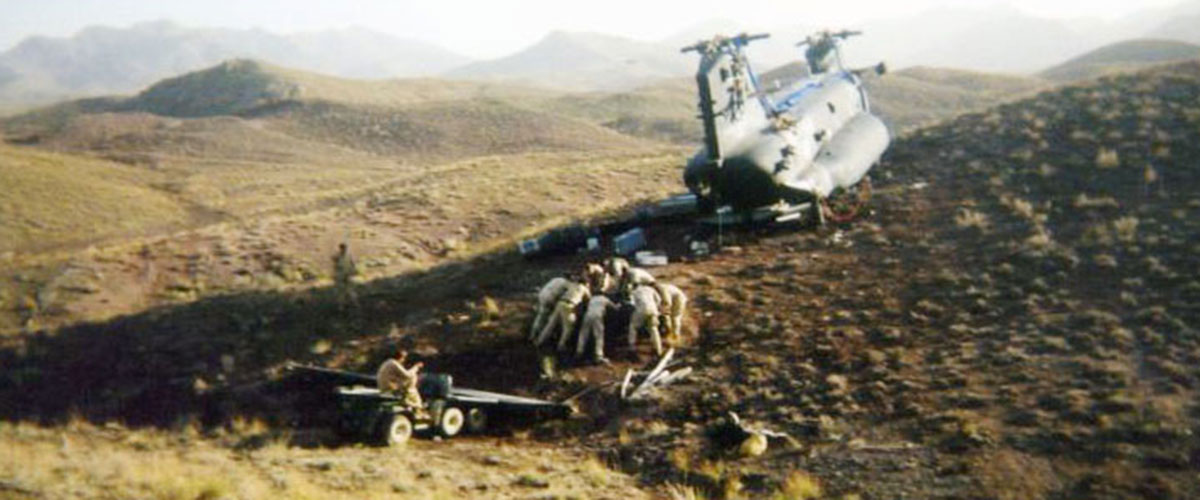 Physically lifting the engines proved to be too much for the exhausted recovery crew, who had been working at high altitude for hours.  They ingeniously used the Gator and the cut rotor blades to roll an engine into the back of the vehicle.
