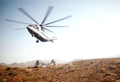 The Mi-26 as it prepared to sling load 476.  Notice CW4 Milch* and CW3 Katz* on the rear, both of whom were lifted into the air and had to jump off the rising airframe.
