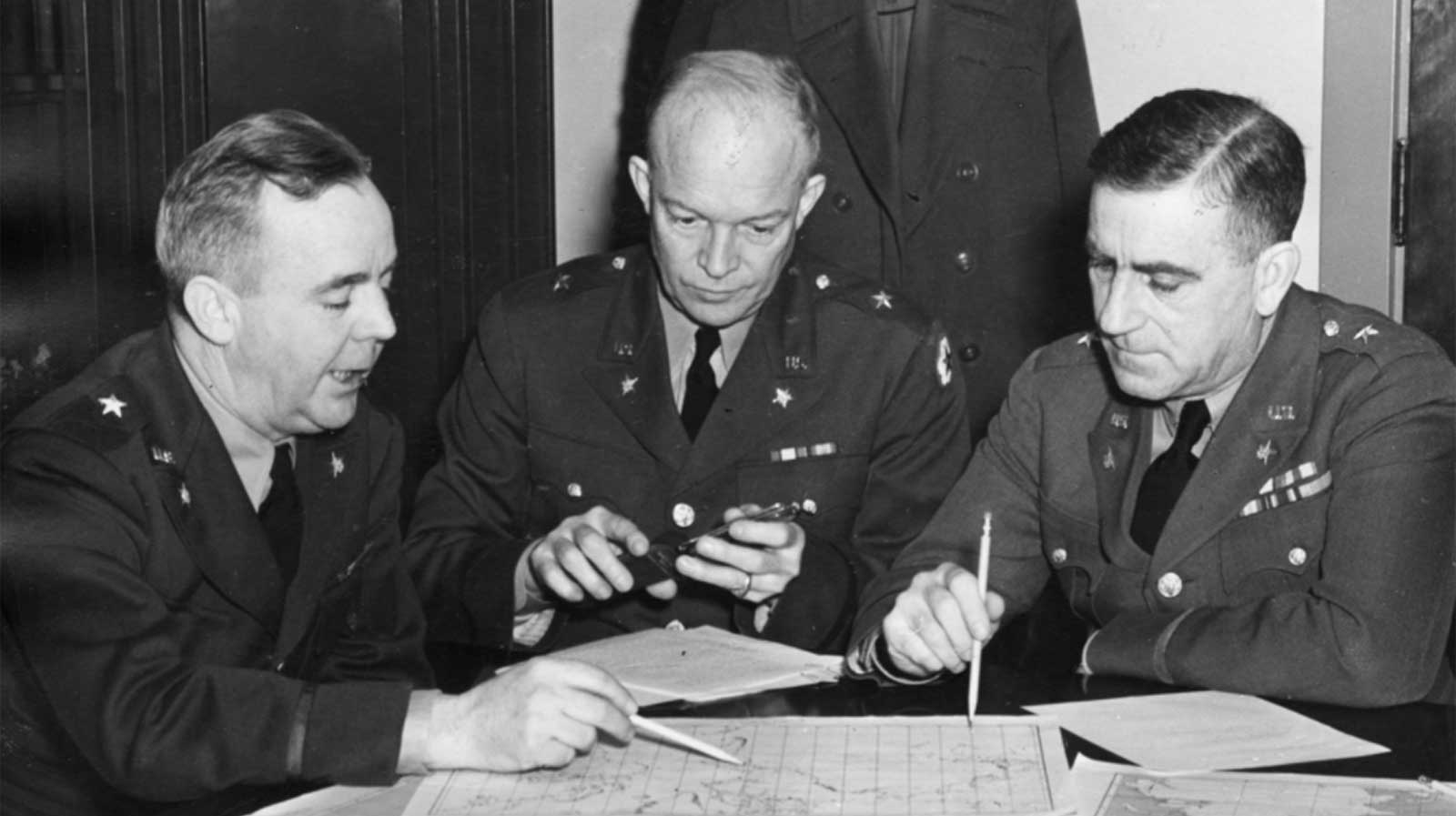 Brigadier General (BG) Dwight D. Eisenhower (center) confers with War Plans Division colleagues BGs Robert W. Crawford (left) and Leonard Gerow (right), in Washington, DC, January, 1942. Promoted to MG in March, Eisenhower thereafter selected Frederick to organize, command, and train the First Special Service Force.