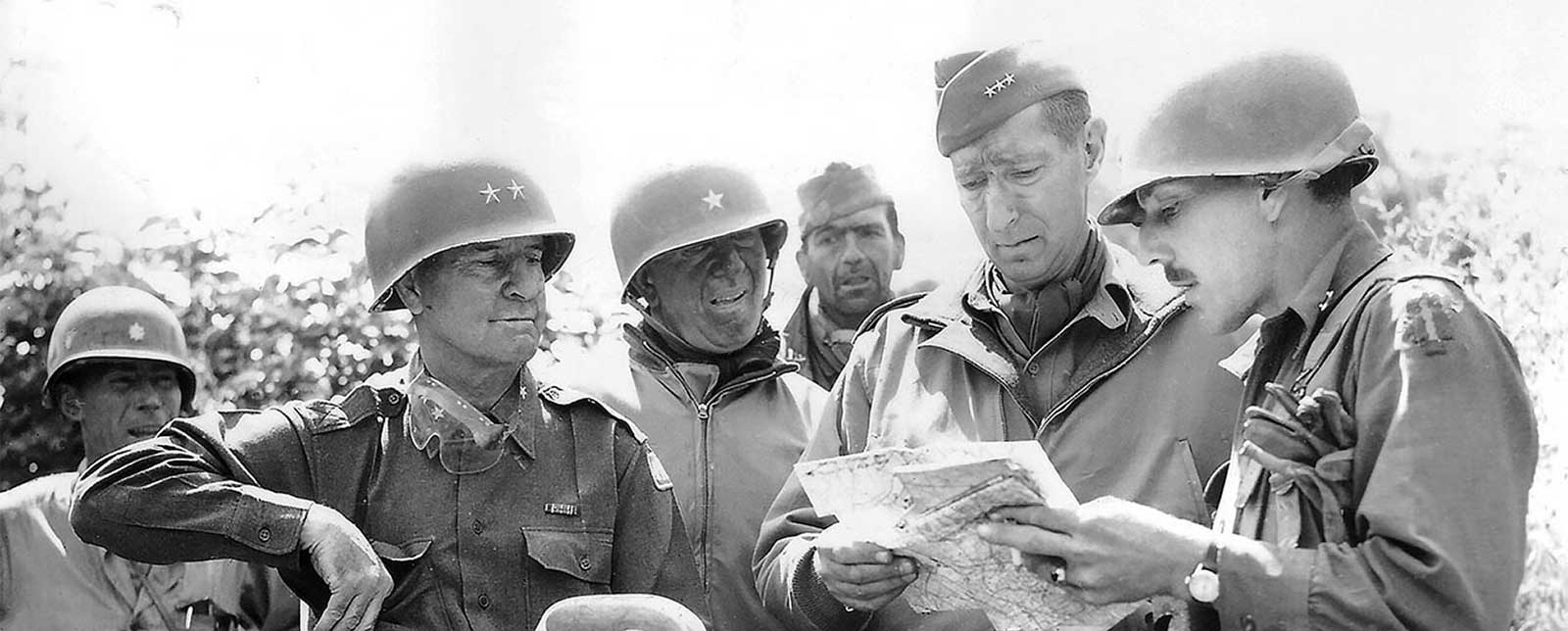BG Frederick <i>(Image credit: right), LTG Mark W. Clark (second from right), and other Fifth U.S. Army officers review a map on the morning of 4 June 1944, the day of Rome’s liberation.
