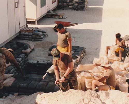 PDB soldiers fill sandbags for a bunker to protect against Scud missile attacks. As it turned out, within Saudi Arabia, KFIA would be spared from Scud missiles, unlike Riyadh, King Khalid Military City (KKMC), and Dhahran.