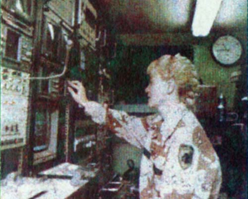 A soldier mans a TSQ-171/TV-T5 mobile television and video production system, which remained at KFIA during combat operations.
