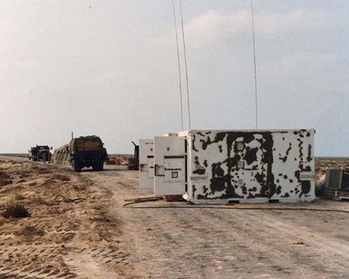 The AN/TRT-22 Audio Control Shelter and AN/TRR-18 Receiver Shelter at Abu Ali.
