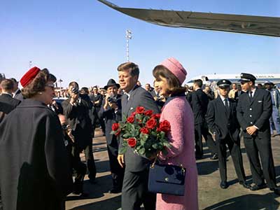 JFK and the First Lady, Jacqueline Kennedy, arrive at Love Field around 1130 hours, 22 November 1963.