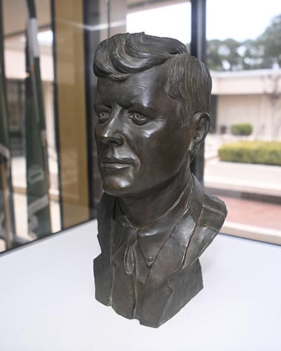 Bust of JFKon  permanent display in the lobby of Kennedy Hall.