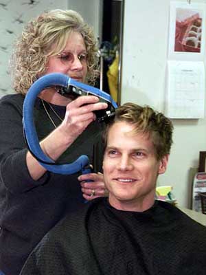 Brian Van Holt receiving 'high and tight' Ranger haircut