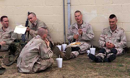 Actors take a break from MOUT training to enjoy some field chow.