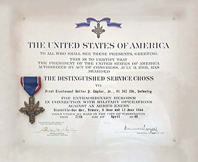The original citation and Distinguished Service Cross presented to Walter P. Taylor.