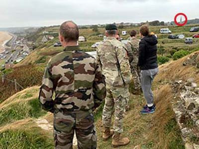 USASOC Command Team follows the path of Company C, 2nd Rangers up the cliffs at OMAHA beach.
