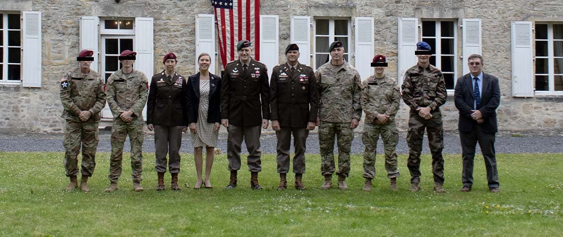 The USASOC Command Team poses outside the Manoir de l'Ormel during their visit to Normandy