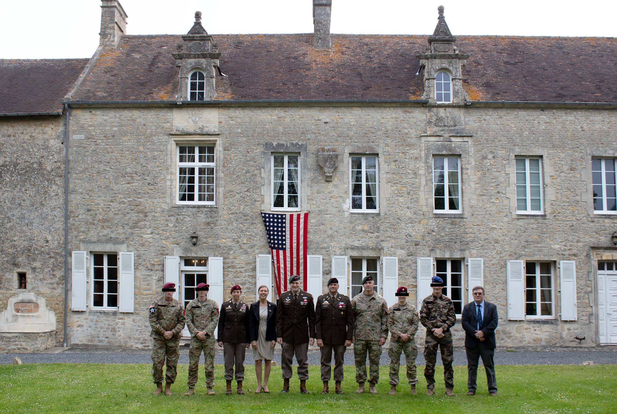 The USASOC Command Team poses outside the Manoir de l’Ormel during their visit to Normandy.