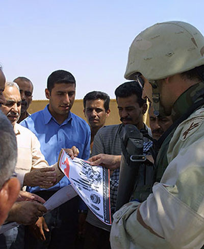 The 315th Tactical Psychological Operations Company developed and distributed handbills and posters warning of mines and unexploded ordnance scattered throughout Baghdad.