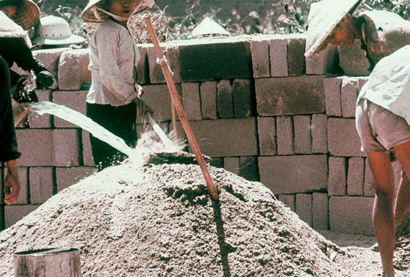 A goal of the 41st teams was to get the locals involved in projects, such as mixing concrete to form into blocks. After the concrete was mixed, it was put into forms and left to harden.