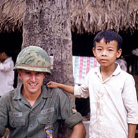 Soldiers of the 41st made fast friends with many of the Vietnamese children as did Specialist Richard MacAdoo.