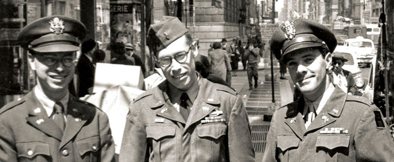 1LT Robert M. Zweck, 2LT David L. Housman, and 2LT Walter D. Ehrgott (left to right) outside of the military induction center in New York City, 1 May 1951, the day that the 301st RB&L Group was federalized.