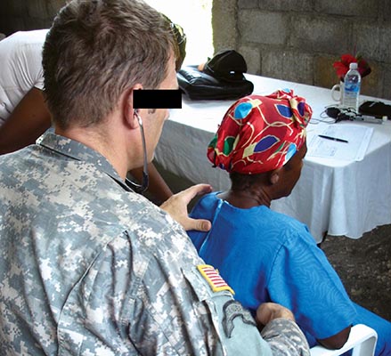 This patient being examined by SSG Dave Ost had tuberculosis. Diseases that are rare in the rest of the Western World are still prevalent in Haiti.