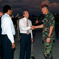 LTG Shelton (right) greets Secretary of State Warren M. Christopher