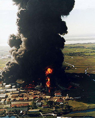 The Viet Cong destroyed 220,000 barrels of fuel at the Nha Be petroleum storage facility ten miles downriver from Saigon