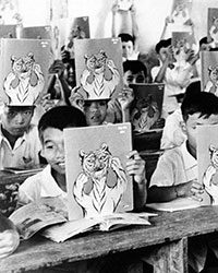 Grammar school students proudly display their ‘Year of the Tiger’ Giap Dan (1974) version 2 calendar/notebooks.