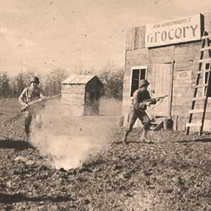 SGT Edward M. Draper and PVT Russell B. Scarboro (Ranger students) conduct live fire ‘mopping up’ in ‘Naziville.’