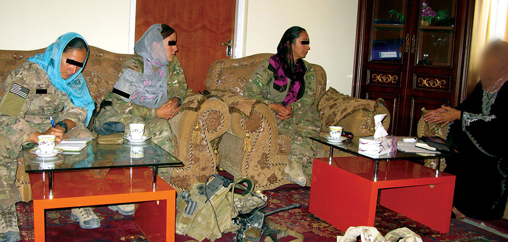 CST-7 members meet with an official in the Afghan Department of Women’s Affairs in Balkh Province, Afghanistan, summer 2014.