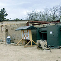 Soviet/Russian legacy building initially housed the CJSOTF kitchen and functioned as the cook’s quarters.  Messing initially took place to the left of the building, where tentage served as the CJSOTF-A Dining Facility on Camp Abel.  Later, a more modern building was constructed.