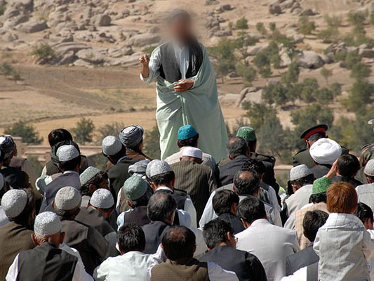 A Mullah speaks at a gathering of Hazaras on the final day of Ramadan.