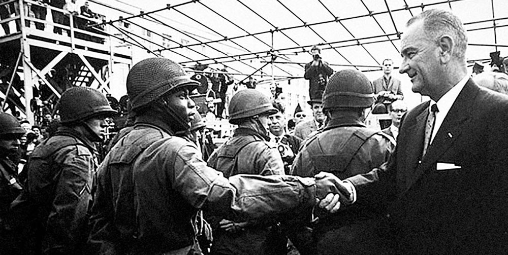 Vice President Johnson welcomed soldiers of the 1st Battle Group, 18th Infantry, 8th Infantry Division, sent from Mannheim  to reinforce Berlin.