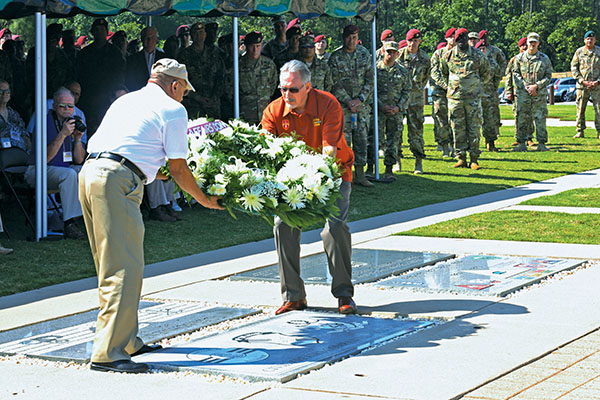 Two Civil Affairs veterans lay a wreath on 3 June 2016 to dedicate the memorial stone to the CA Companies that served in Vietnam.