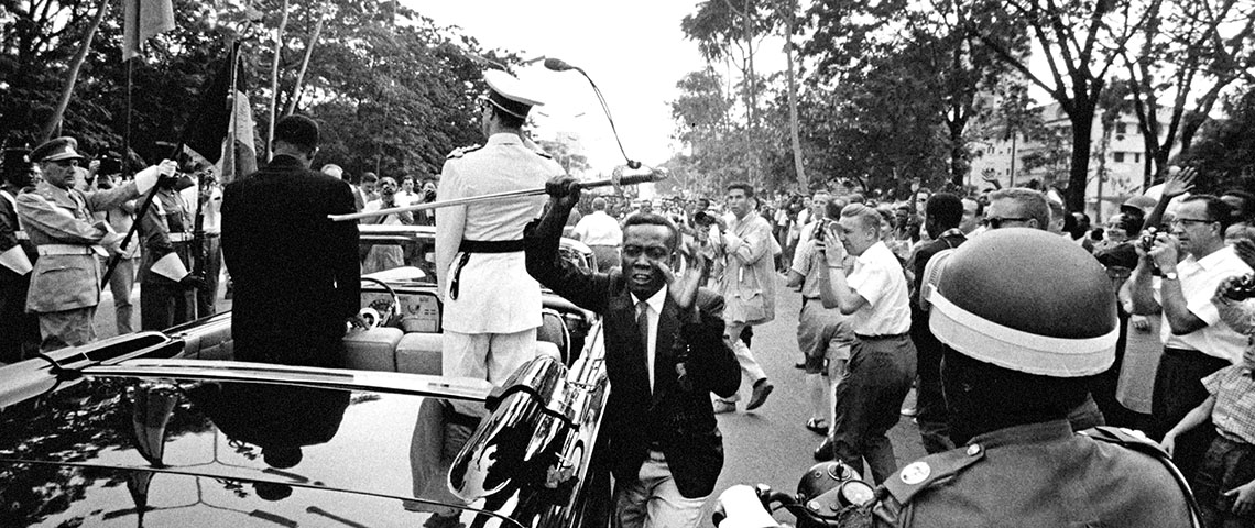 A Congolese named Ambroise Boimbo stole King Baudoin’s sword as the automobile cavalcade of dignitaries moved through Leopoldville for the Independence Ceremony.