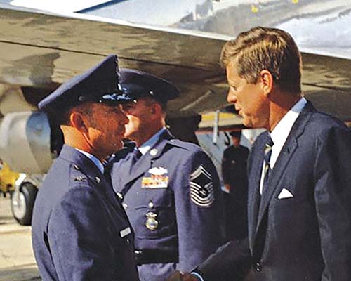 President John F. Kennedy was welcomed by the Pope Air Force Base commander and LTG Thomas J. H. Trapnell