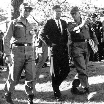 LTG Hamilton L. Howze, Commanding General, XVIII Airborne Corps, escorted President Kennedy from the reviewing area at McKellar’s Pond.